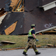 The aftermath of a tornado south of Birmingham, Alabama on March 25, when forecasters were urging that nobody but emergency officials and media in the affected region access the NWS Chat Service, lest it crash.